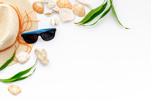 Straw Hat, Sun Glasses, Shells And Plant On White Background Top View Mockup