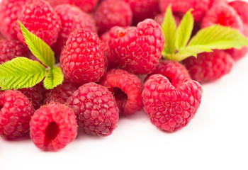 Poster - Raspberry with leaves isolated on white background