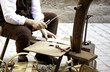 © celiafoto - Craftsman making baskets