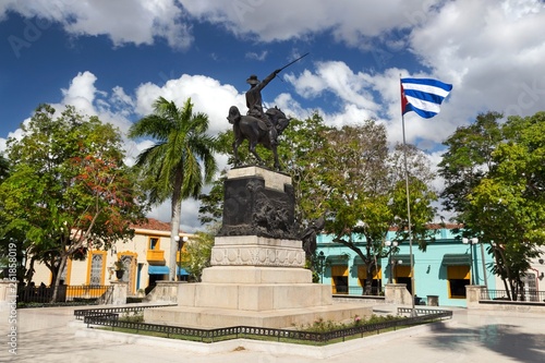 Fotomural Ignacio Agramonte Public Park in Camaguey Cuba Town Square with Cuban Flag and