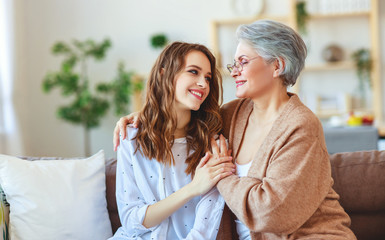 Wall Mural - happy family two generations old mother and adult daughter