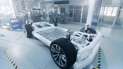 Wall Mural - Concept of Authentic Electric Car Platform Chassis Prototype Standing in High Tech Industrial Machinery Design Laboratory. Hybrid Frame include Tires, Suspension, Engine and Battery. 