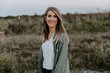 © MeganMahoneyPhotos - Portrait of Beautiful Young Adult Professional Female Woman Fashion Model Person Smiling Outside at the Park in Nature with Natural Outdoor Sunset Light