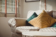 © weedezign - Close up pillow on sofa at home in morning with sunlight.Furniture in house background with light shade on object