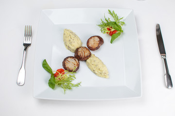 Wall Mural - grilled scallops with celery puree and vegetables. on a white plate