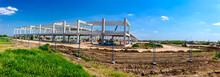 Panoramic View On Landscape Transform Into Industrial Building Machinery, People Are Working