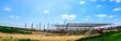 Panoramic view on landscape transform into industrial building machinery, people are working