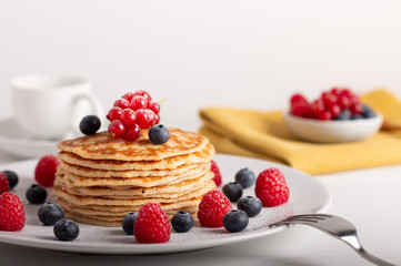 Canvas Print - pancakes with raspberries and blueberries