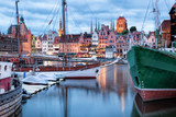 Fototapeta Łazienka - Downtown of Gdansk with boats in harbor during evening,Poland