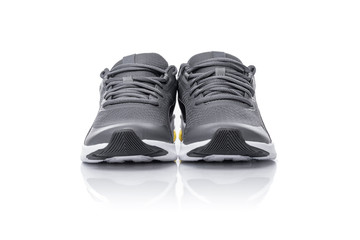 Unbranded black sport running shoes or sneakers isolated on white background.