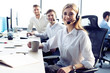 © opolja - Female customer support operator with headset and smiling