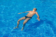 © aaalll3110 - tanned man on vacation swimming in the pool
