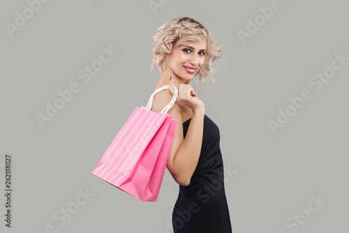 Happy Model Holding Pink Shopping Bags Beautiful Woman With Short