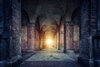 canvas print picture - Rays of divine light illuminate old arches and columns of ancient buildings. Bologna, Italy. Conceptual image on historical, religious and travel theme.