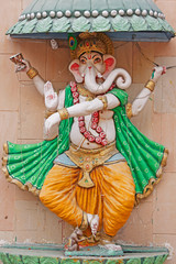 Wall Mural - Sculpture dedicated to Ganesha, the elephant god, outside a Hindu temple at New Delhi