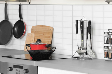 Poster - Clean cookware and utensils in modern  kitchen