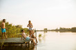 © BGStock72 - Young people having fun at the lake on a summer day