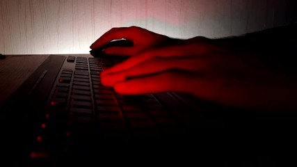 Male hand working on a computer keyboard. Time lapse.