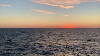 Wall Mural - Beautiful golden sunrise over the Gulf of Mexico ocean with copy space