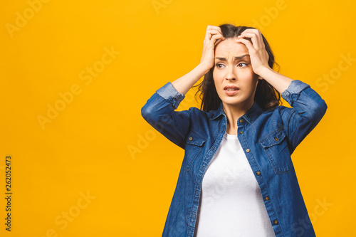 Fotografía Young beautiful woman over isolated background suffering from headache desperate and stressed because pain and migraine