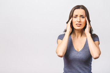 Wall Mural - Young beautiful woman over isolated background suffering from headache desperate and stressed because pain and migraine. Hands on head.