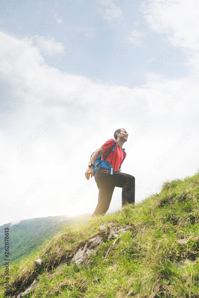 Man hiking in the Carpathian Mountains, Romania