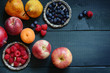 © Barbara - Variety of fresh fruit arranged on a wooden table