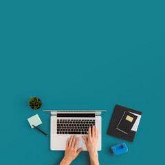 Man using laptop. Top view on workspace with copy space.