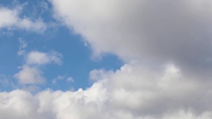 Wall Mural - cloudscape time lapse 01 loop - looping 60 second video footage features real clouds flying by in sm