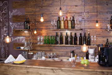 Interior design of a vintage coffee shop with fireplace in the background