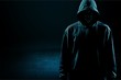 © BillionPhotos.com - Dark unrecognisable man in hoodie on background