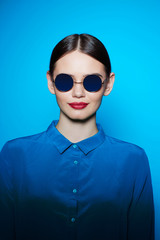  fashion model in sunglasses, beautiful young woman.