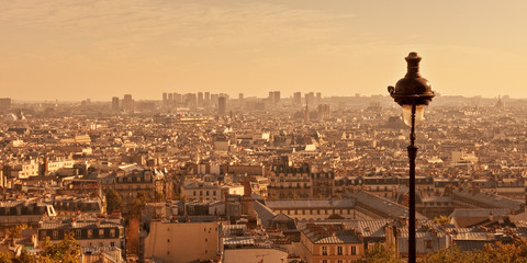 Fototapete - Aerial view of Paris from Montmartre hill at sunset, France
