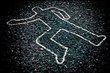 © mesamong - Crime Scene with Body Outline Chalk Drawing on Asphalt Ground, Selective Focus.
