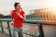 © ivanko80 - Young fitness woman running outdoors