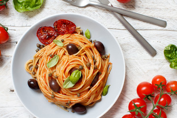 Wall Mural - Spaghetti with tomato sauce olives and capers