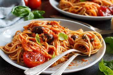 Wall Mural - Spaghetti with tomato sauce olives and capers