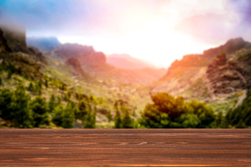 Wall Mural - Desk of free space and summer mountains landscape 