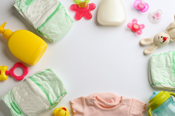 Wall Mural - flat lay composition with baby accessories and space for text on white background