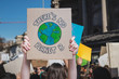 © Nicola - There is no planet b poster claim during a street protest for climate change, fridays for future