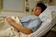 © Michele - young man at the hospital on hospital bed