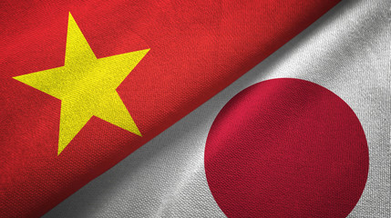 Vietnam and Japan two flags textile cloth, fabric texture