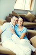 © vgstudio - Young smiling couple at home