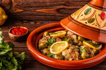 Wall Mural - Traditional Moroccan chicken tagine with olives and salted lemons