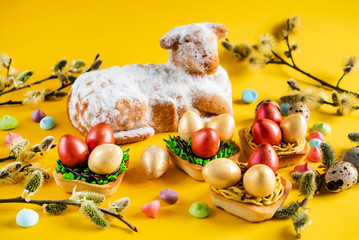 Wall Mural - Easter pastries on the yellow background