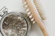 Salty body scrub with lavender and wooden brush with natural bristle for dry anticellulite massage
