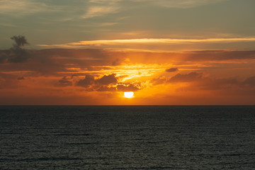 Wall Mural - sunset at ocean seascape with clouds