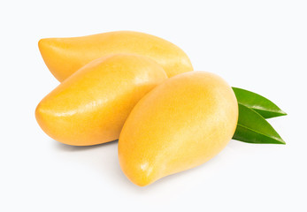 Closeup ripe mango tropical fruit with leaves isolated on white background