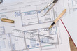 © RomanR - Close-up on house plan with ruler, pen and notebook