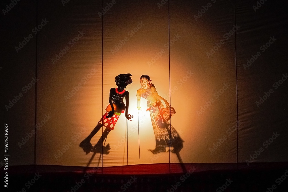 Nang Talung traditional Thai puppet shadow theater playing on stage ...